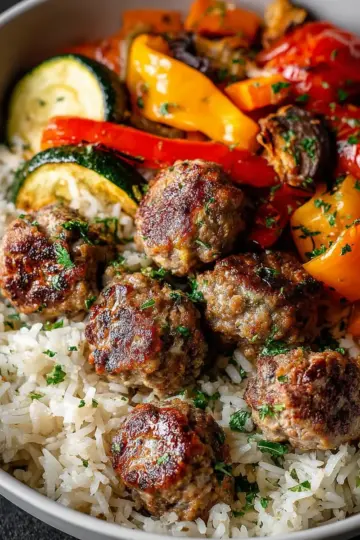 Savory Meatballs with Rice and Roasted Vegetables Recipe